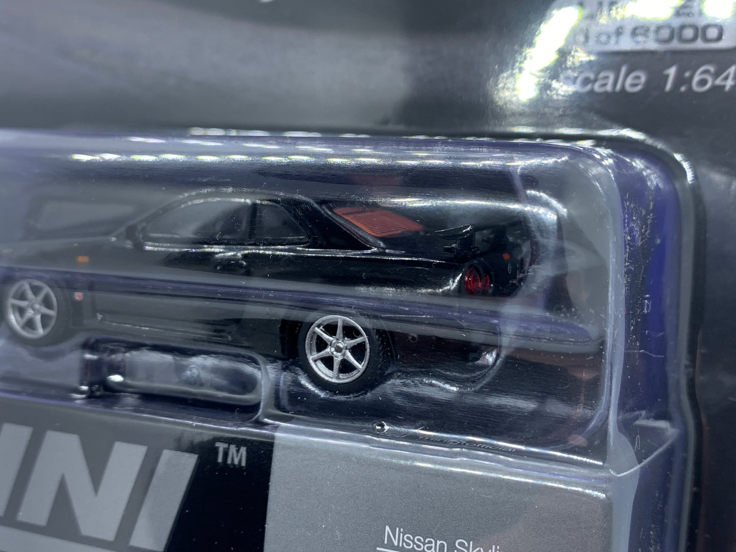 MINI GT - Nissan Skyline R34 GT-R Black Pearl - Display Blister Packaging