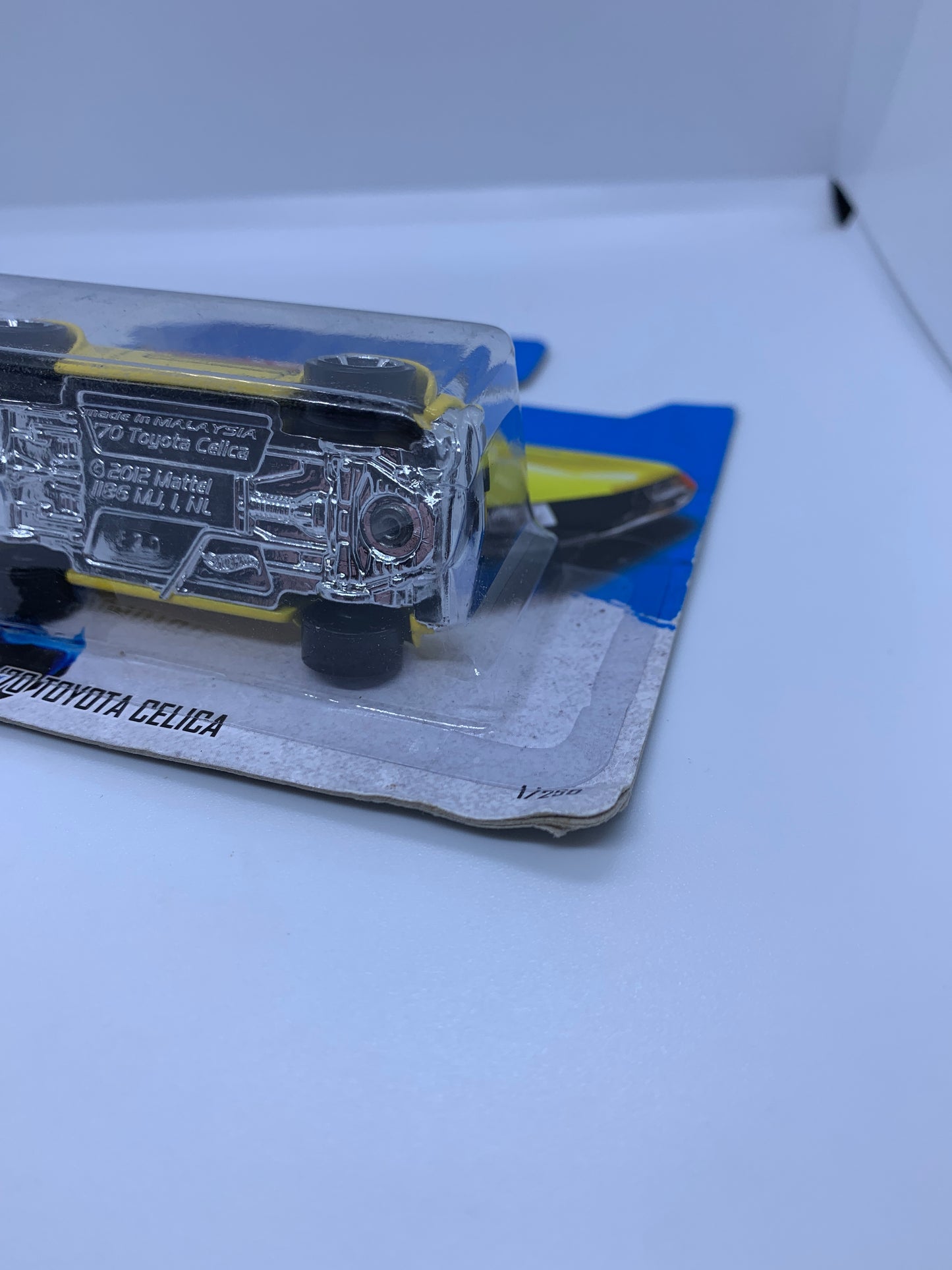 Hot Wheels - ‘70 Toyota Celica Yellow - Damaged Card