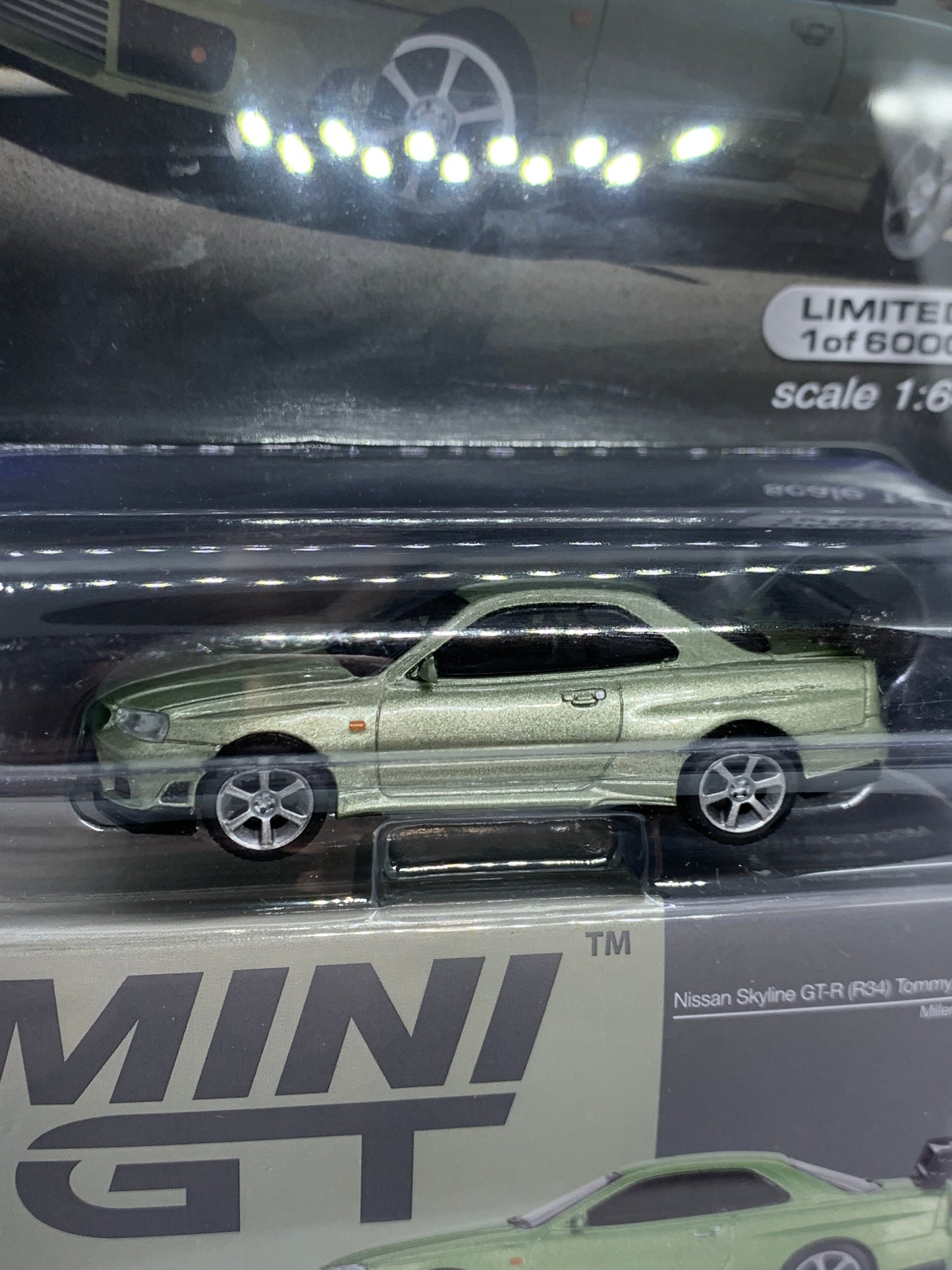 MINI GT - Nissan Skyline GT-R R34 TommyKaira R-Z Millenium Jade - Display Blister Packaging