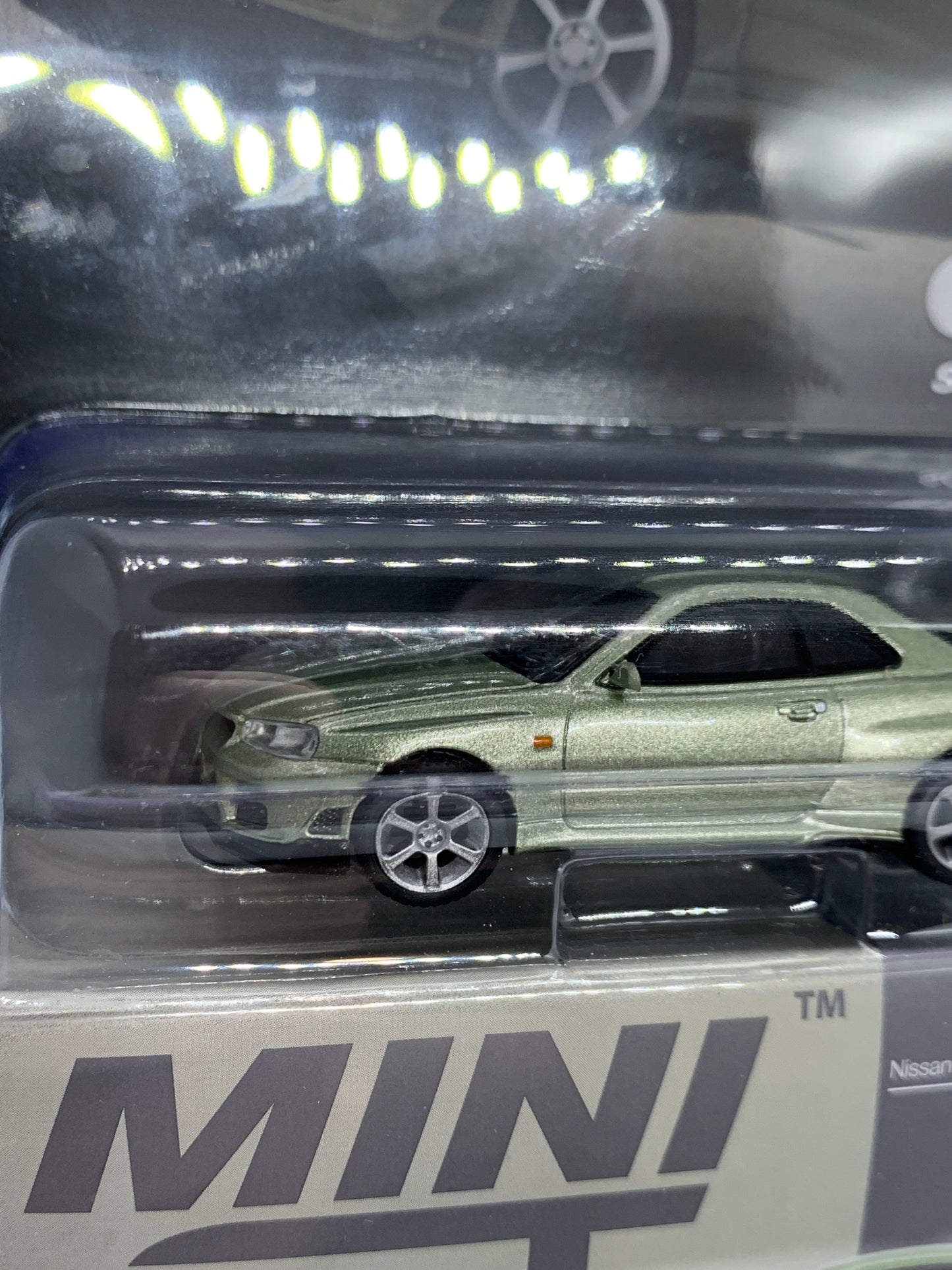 MINI GT - Nissan Skyline GT-R R34 TommyKaira R-Z Millenium Jade - Display Blister Packaging