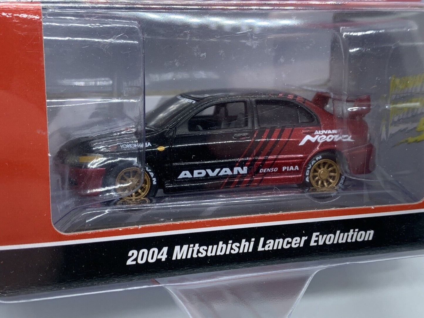 Johnny Lightning - 2004 Mitsubishi Lancer Evo - Advan Racing - Mijo Limited Edition